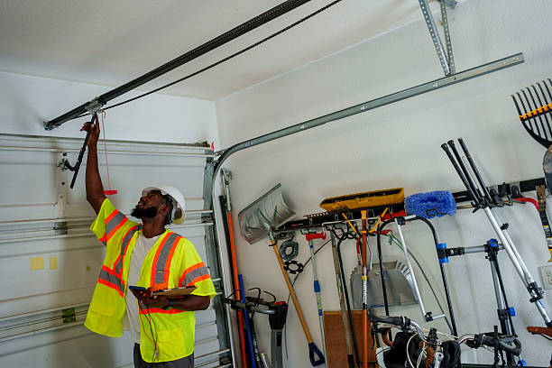 Professional Garage Door technician working in Hamlin, TX